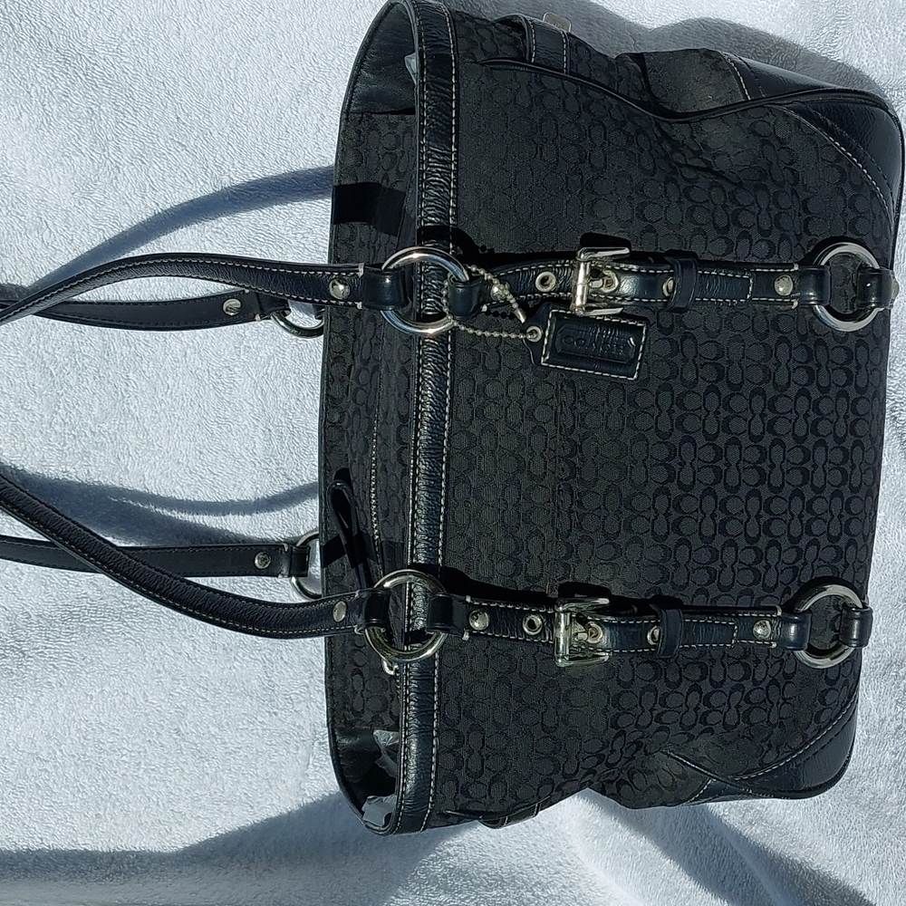 COACH black shoulder bag, zip top, multiple pockets.